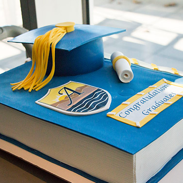 Graduation Cake at Alexander College Saying Congratulations