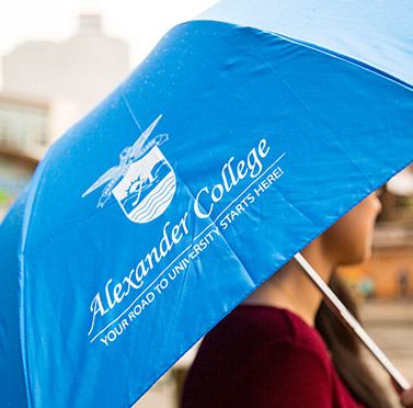 Student Holding an Umbrella during Rainy season in Vancouver