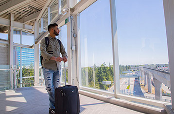 Alexander College international student at the airport