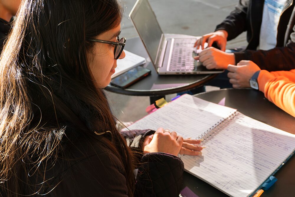 student reviewing her notes