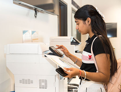 student using the printer