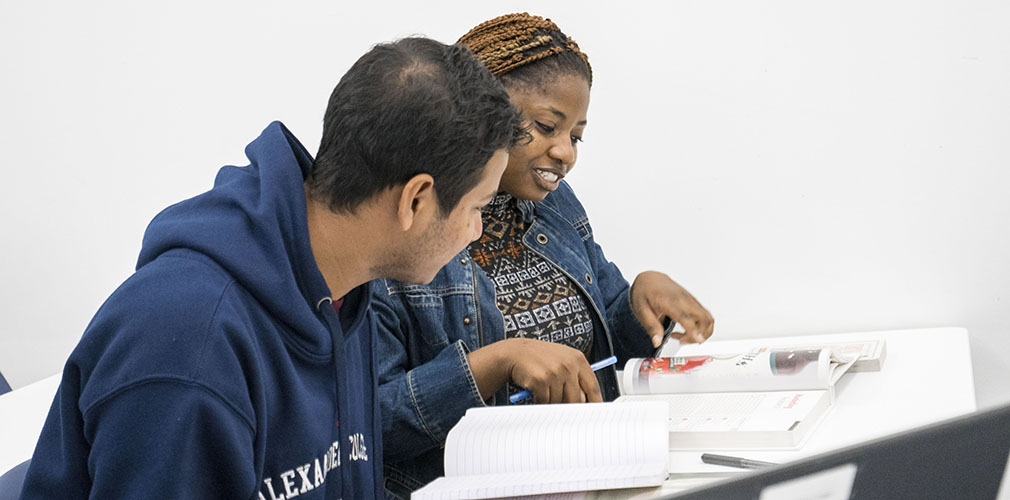 students discussing an assignment