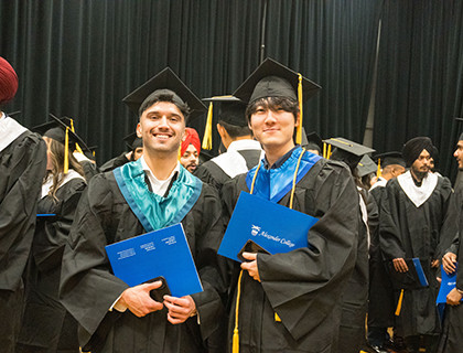 two students graduating 