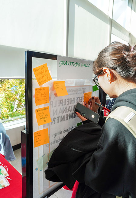 student writing on the board