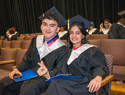 two students at grad