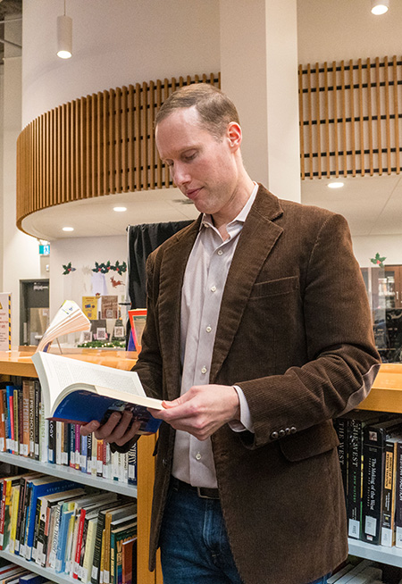 Chris reading a book