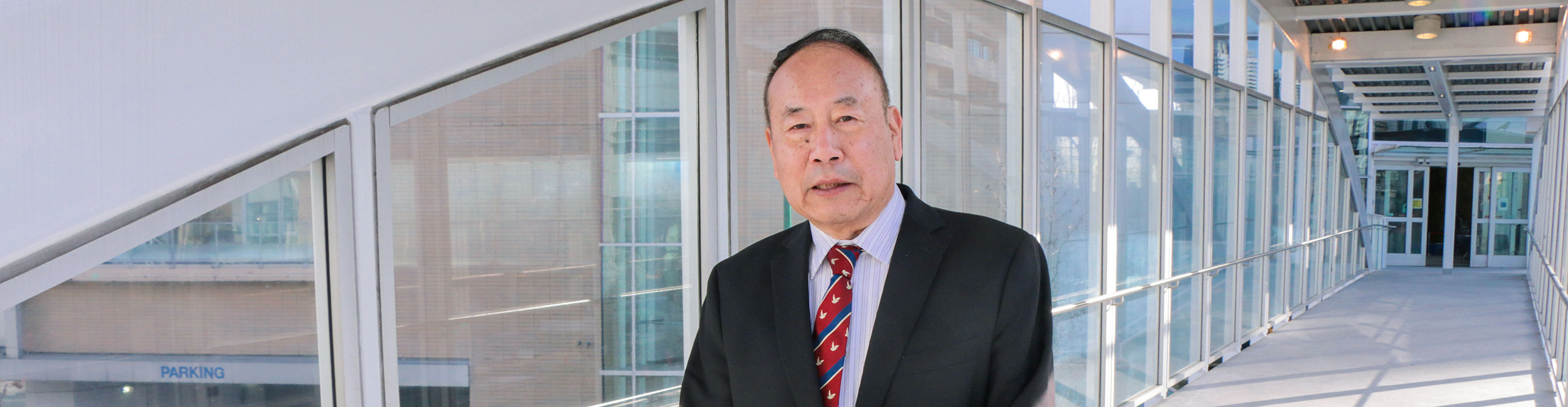 President of Alexander College, Guangwei Ouyang