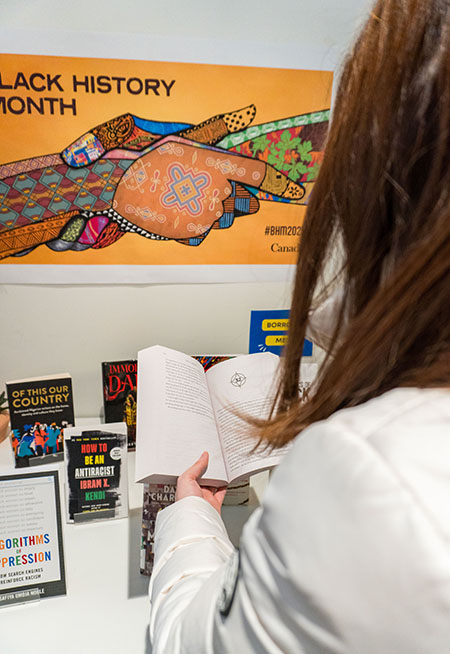 student reading book