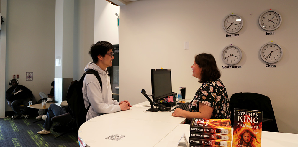 Ben talking to staff