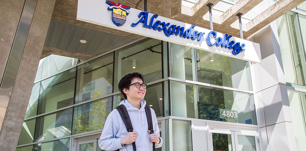 Ben standing outside Alexander College Burnaby