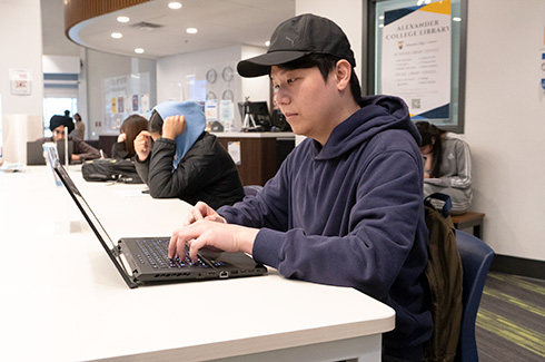 student using a laptop