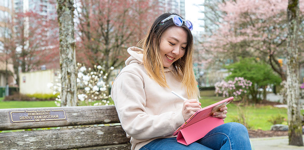 Arisa using her iPad