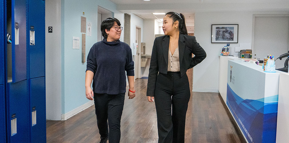 Beku talking to staff