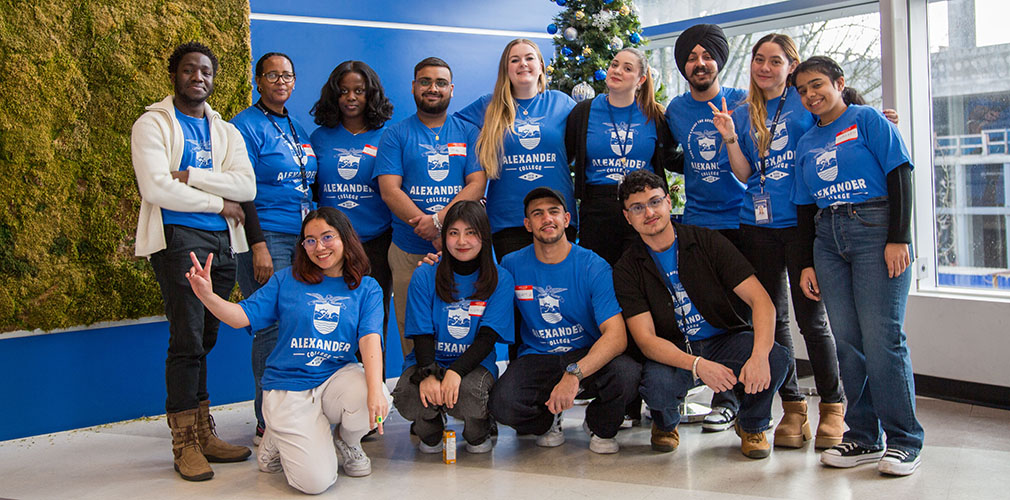 volunteers pose for a photo