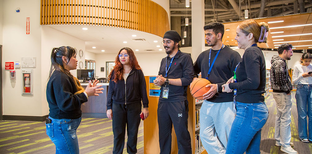 Fritzie talking to staff and students